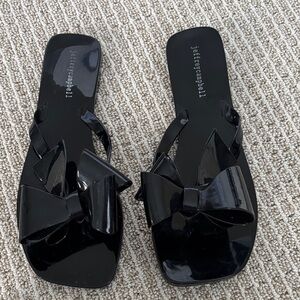 Jeffrey Campbell Black Patent Bow Sandals
Fits like 9.5 avail. whole sizes only